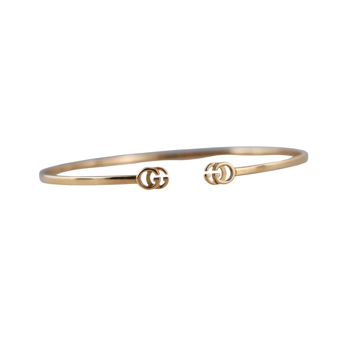 Gucci Running GG 18K Gold Bangle Bracelet Size 17