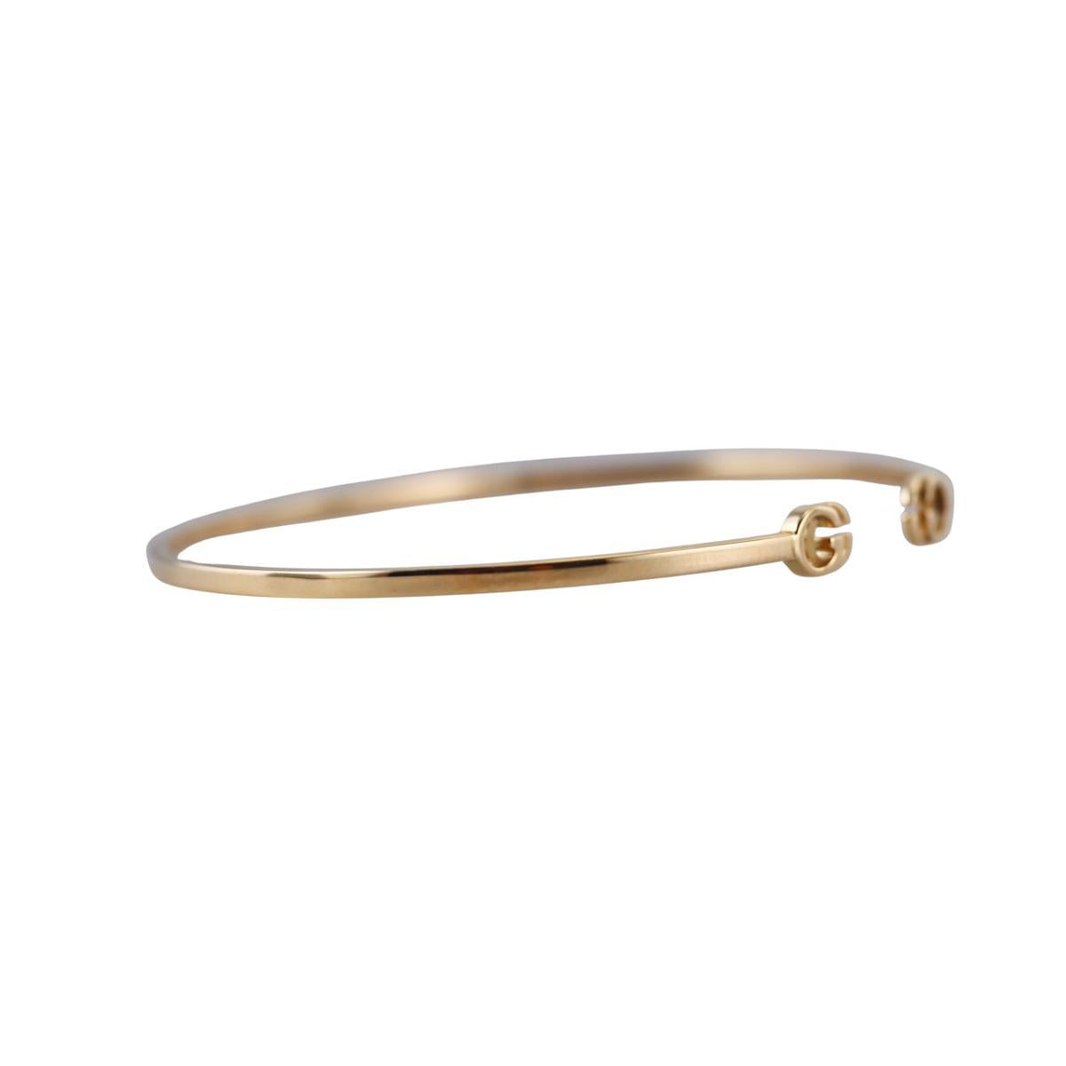 Gucci Running GG 18K Gold Bangle Bracelet Size 17
